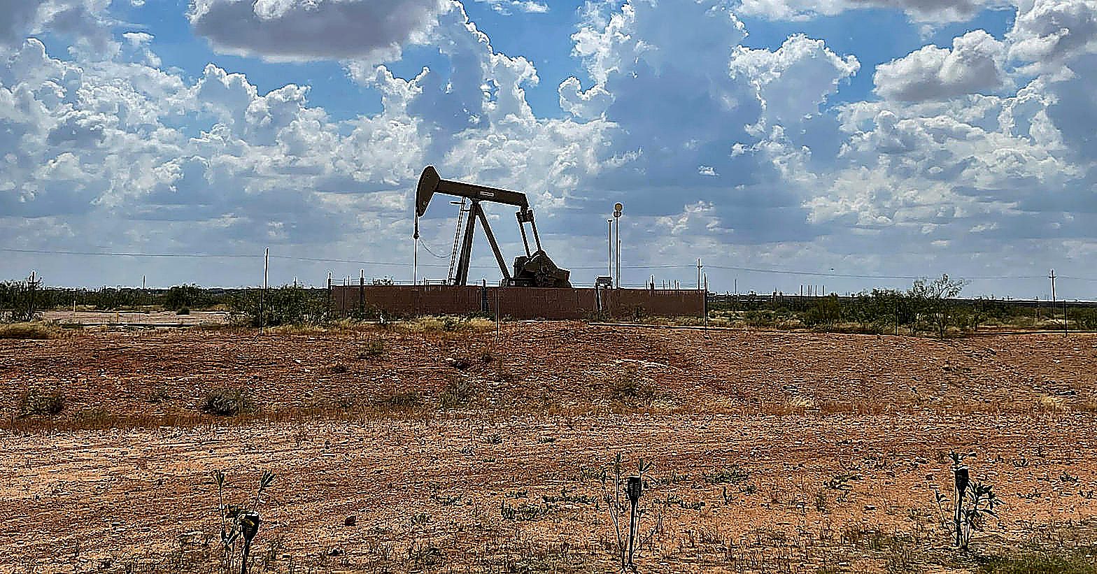 A pumpjack in the Permian Basin near Midland, Texas, October 8, 2025. It is not Friday’s settlement, and it is not the Strait of Hormuz.