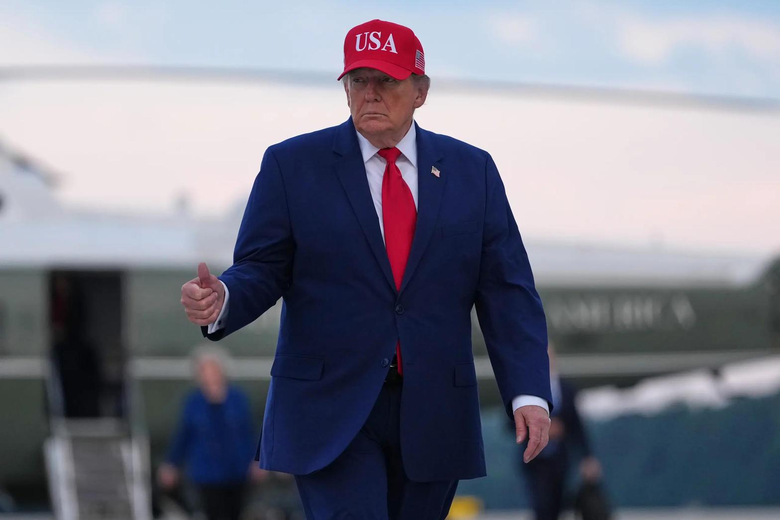 President Trump, thumbs up, on Friday, the day he put the Graham Russia sanctions on hold.