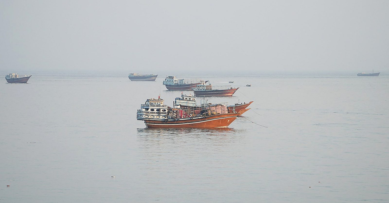 Vessels in the Strait of Hormuz, seen from Musandam, Oman, on Oct. 23, 2026. Reuters. It is not the Louise 1, and no crew is named.