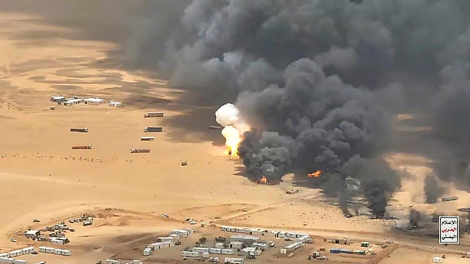Black smoke and orange fire at a southern Saudi energy site after Houthi strikes. No figures in the frame. News photograph, Tuesday, Sept. 8, 2026.