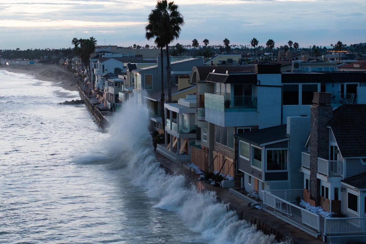 Surf already reaches houses on the California coast. A Kelvin wave tied to El Niño is raising the water by inches, not as a tsunami.