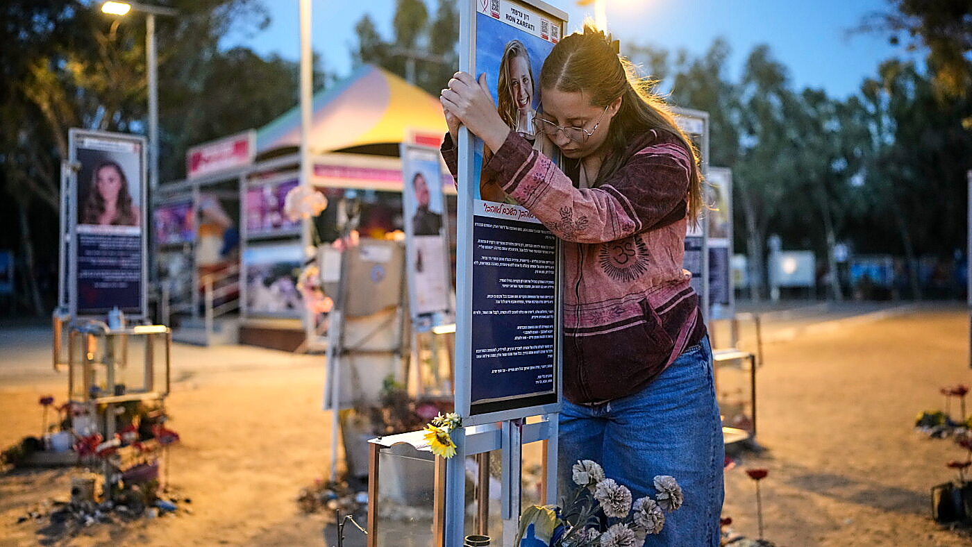 A mourner at a memorial on the third anniversary of the Oct. 7 attack.