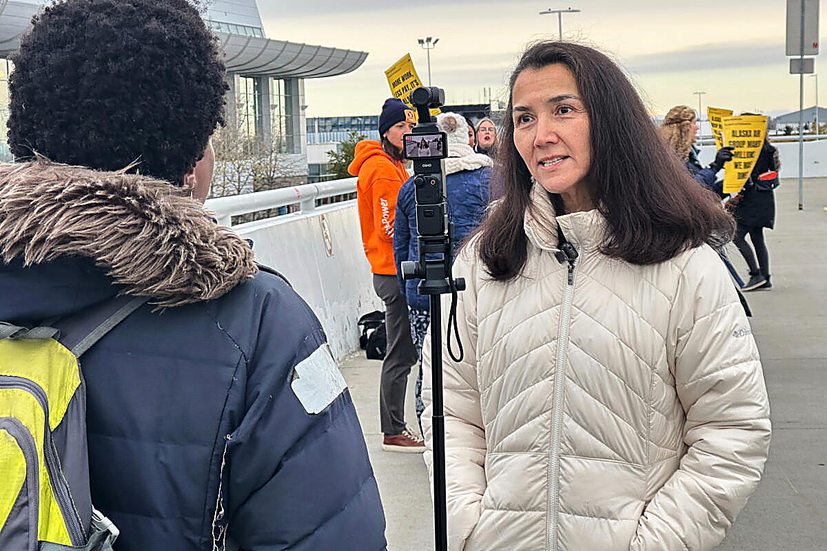 Mary Peltola speaks to a reporter at a picket for Horizon Air flight attendants, Wednesday, Oct. 14, 2026, in Anchorage. Becky Bohrer, Associated Press. It is not Thursday's denial. The other face is turned away.